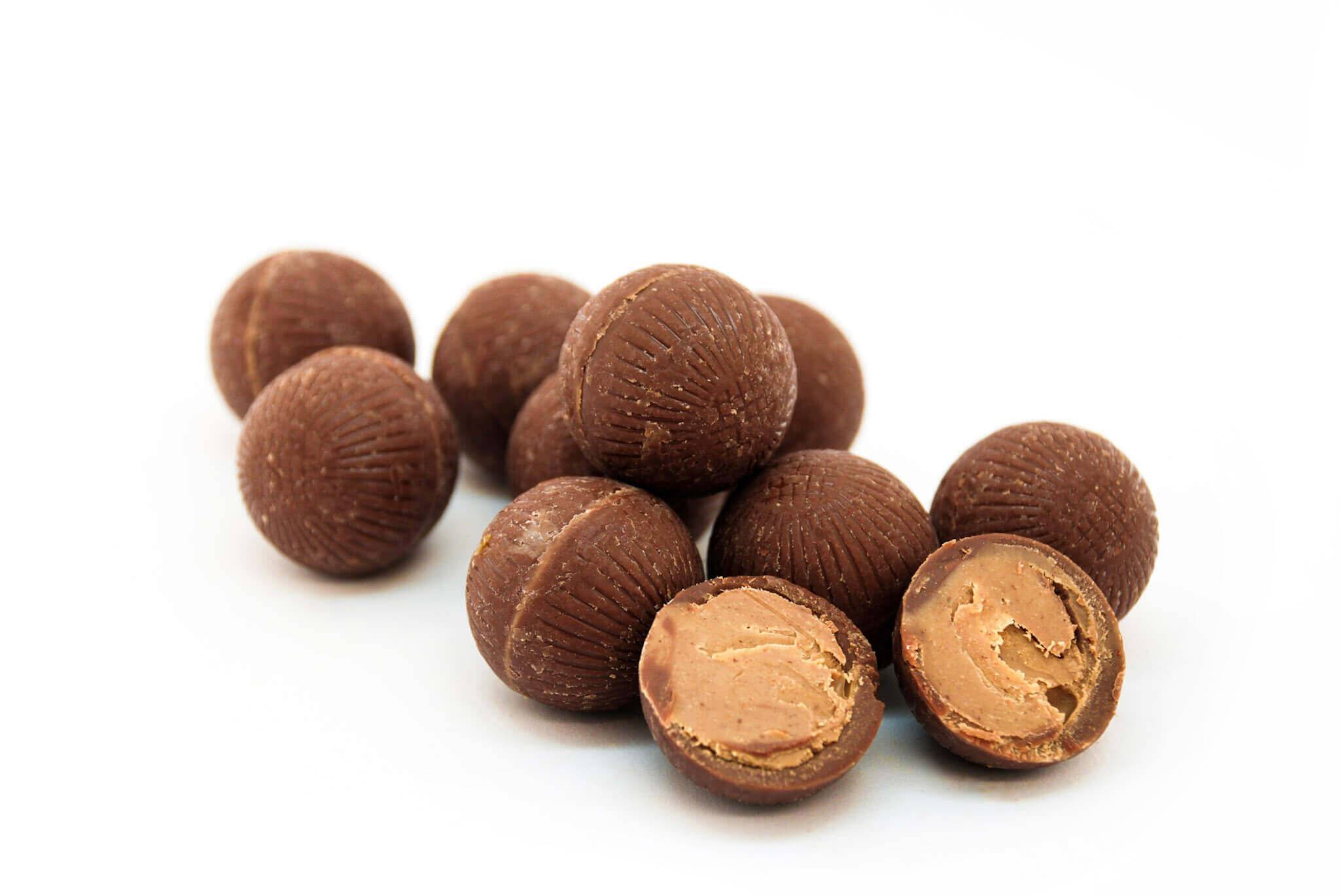 Caramilk truffles_Edited Organic Nutty Caramel Filled Mylk Truffles image